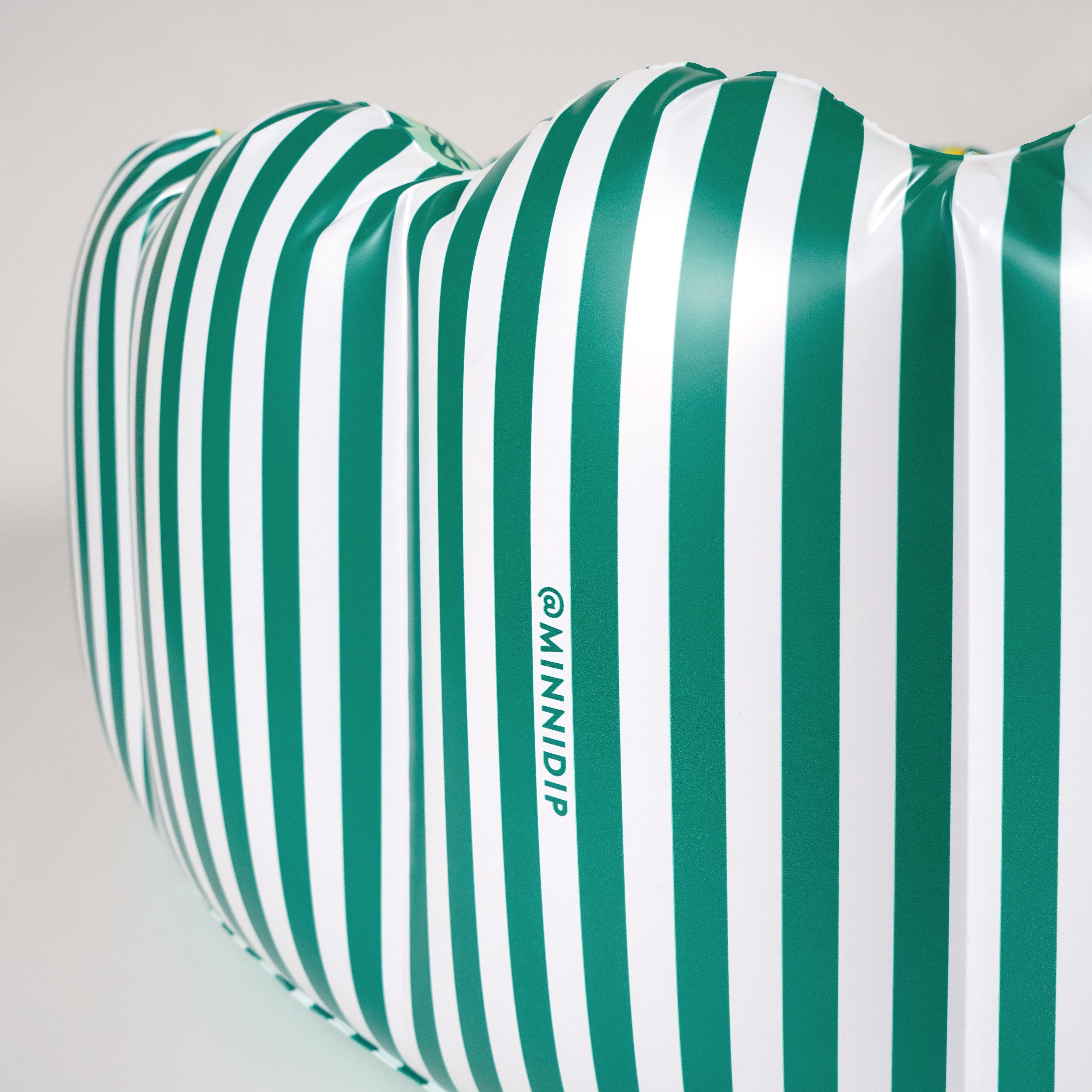 the Tufted STRIPED LIMONE luxe inflatable pool