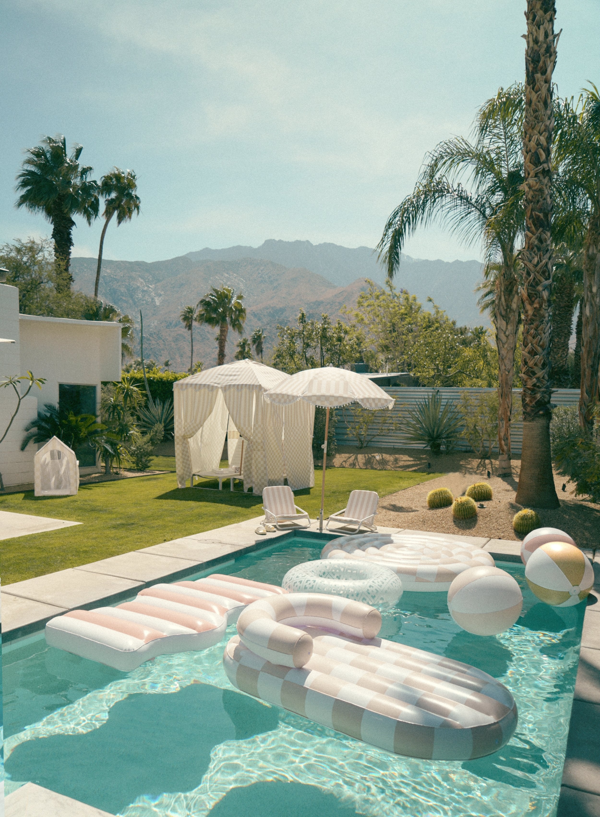 the ARCHED CHECKER Luxe Inflatable Chaise Lounger