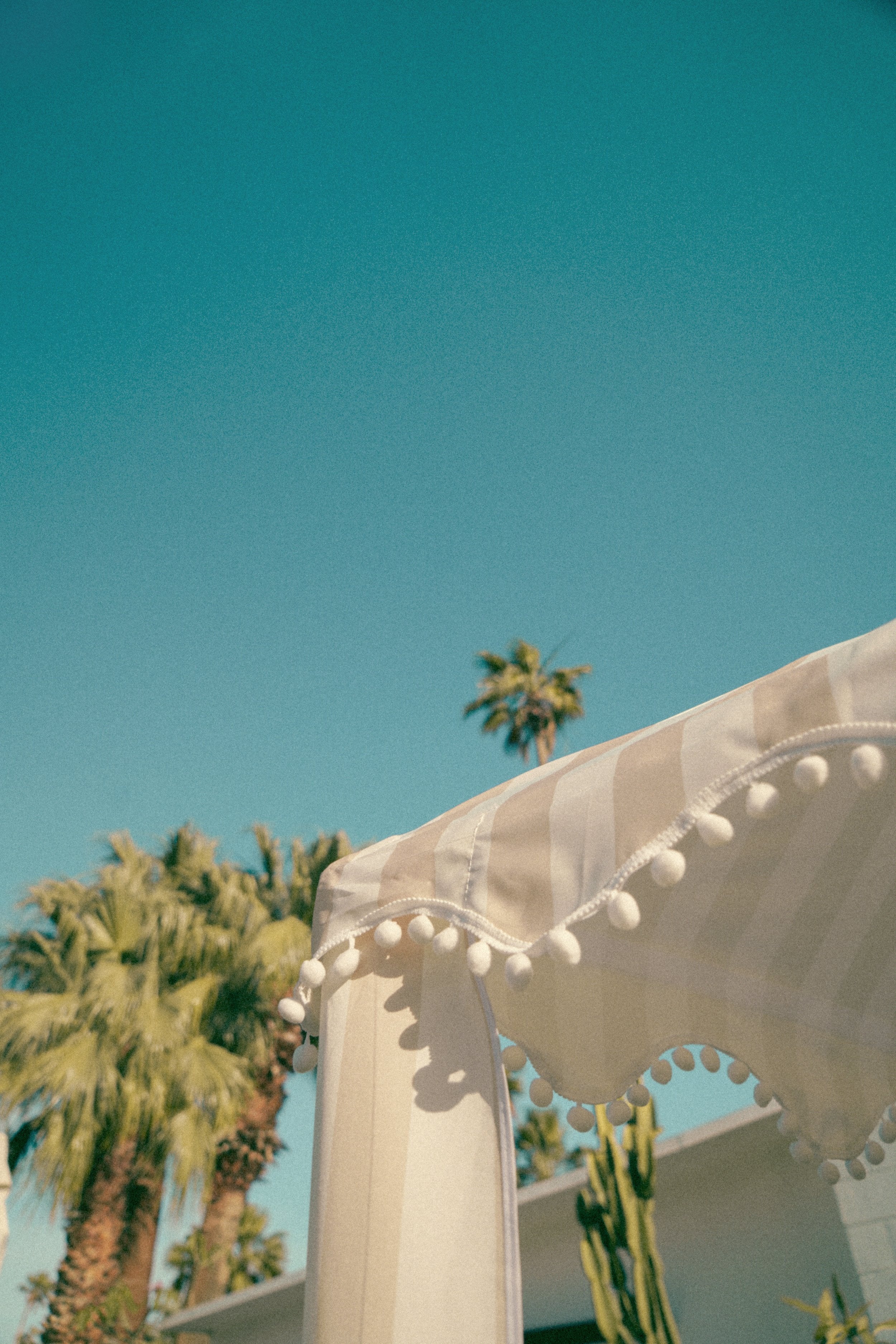 the CHECKER CABANA STRIPE Beach Cabana in Sand