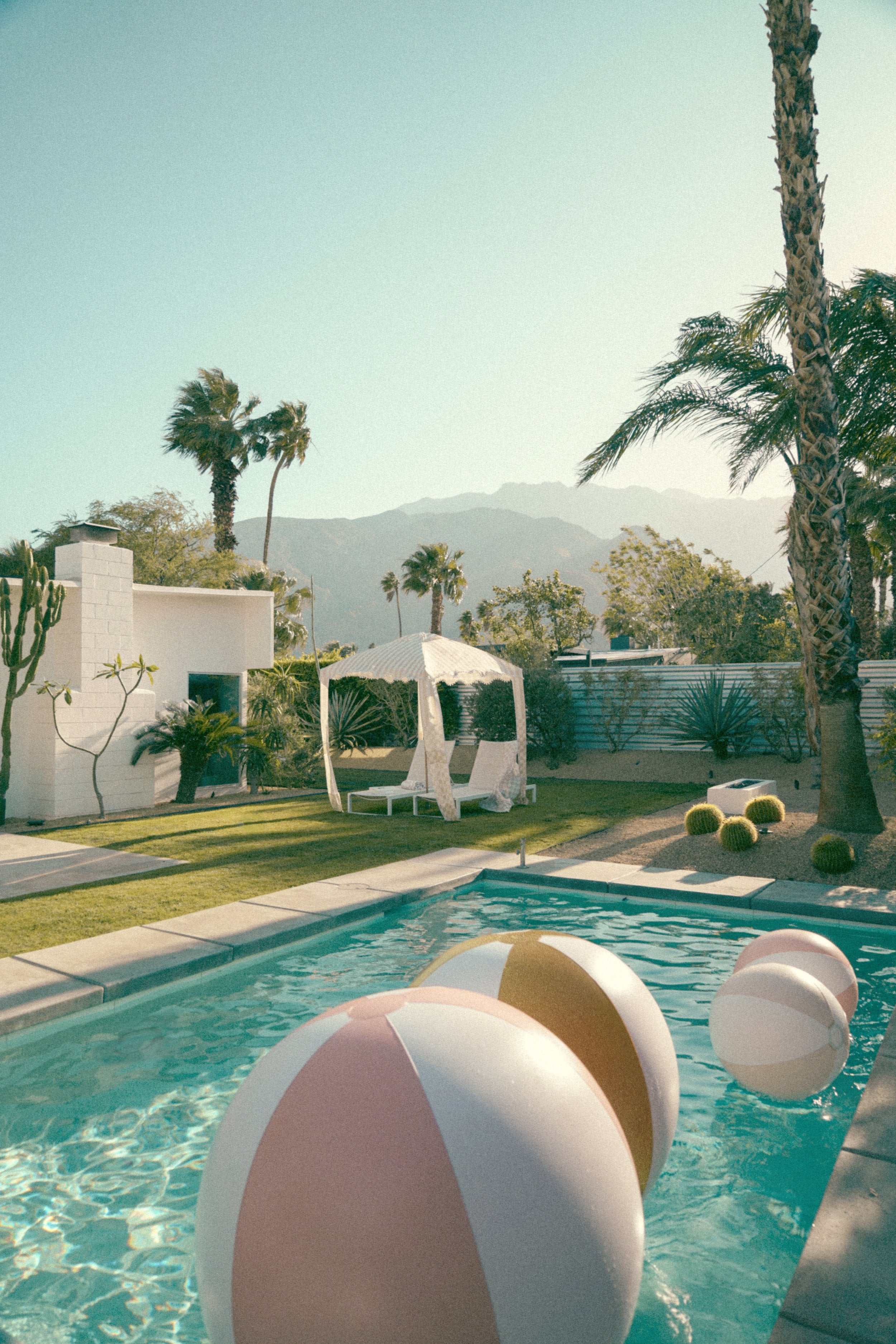 the CHECKER CABANA STRIPE Beach Cabana in Sand