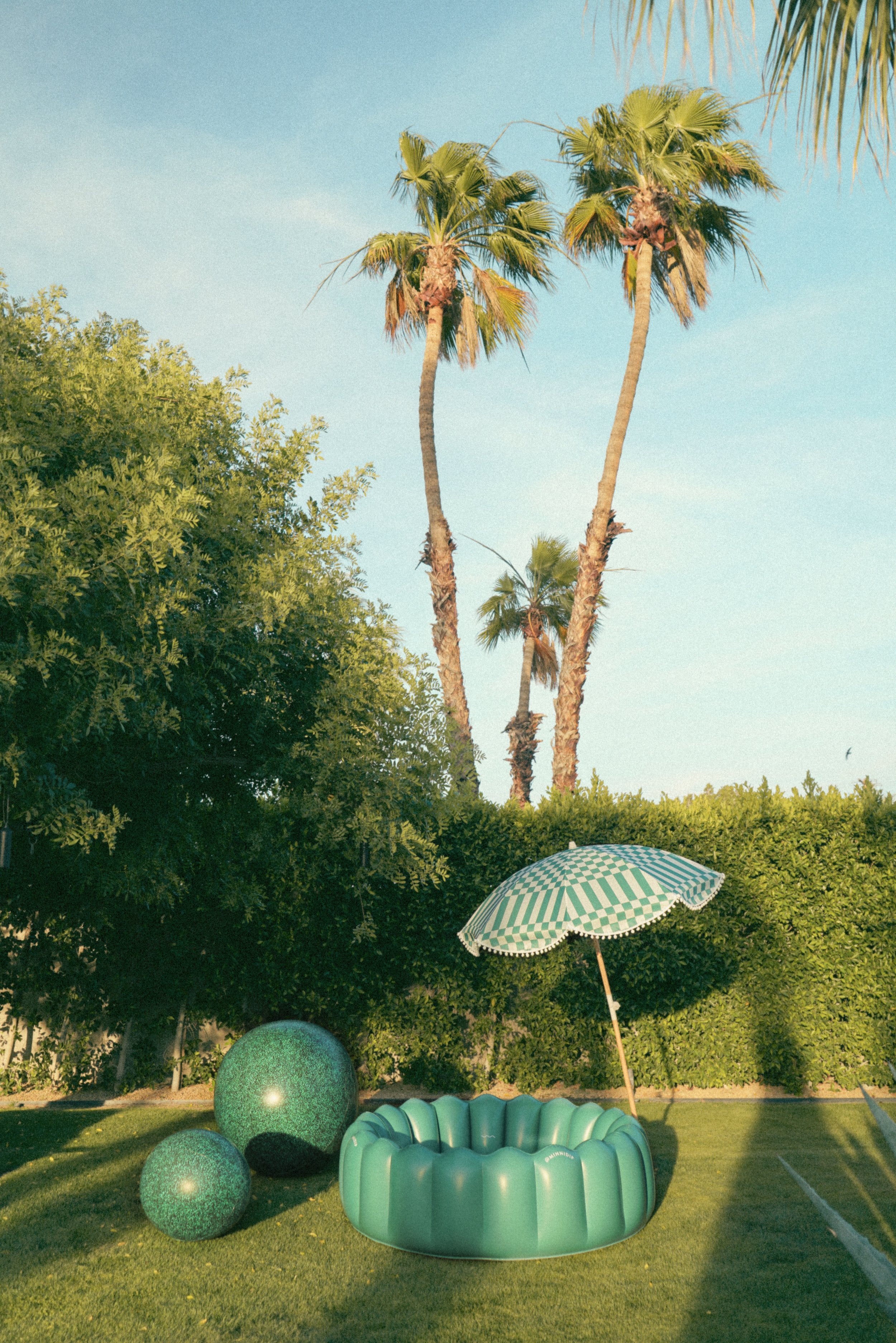 the CHECKER CABANA STRIPE Beach Umbrella in Topiary