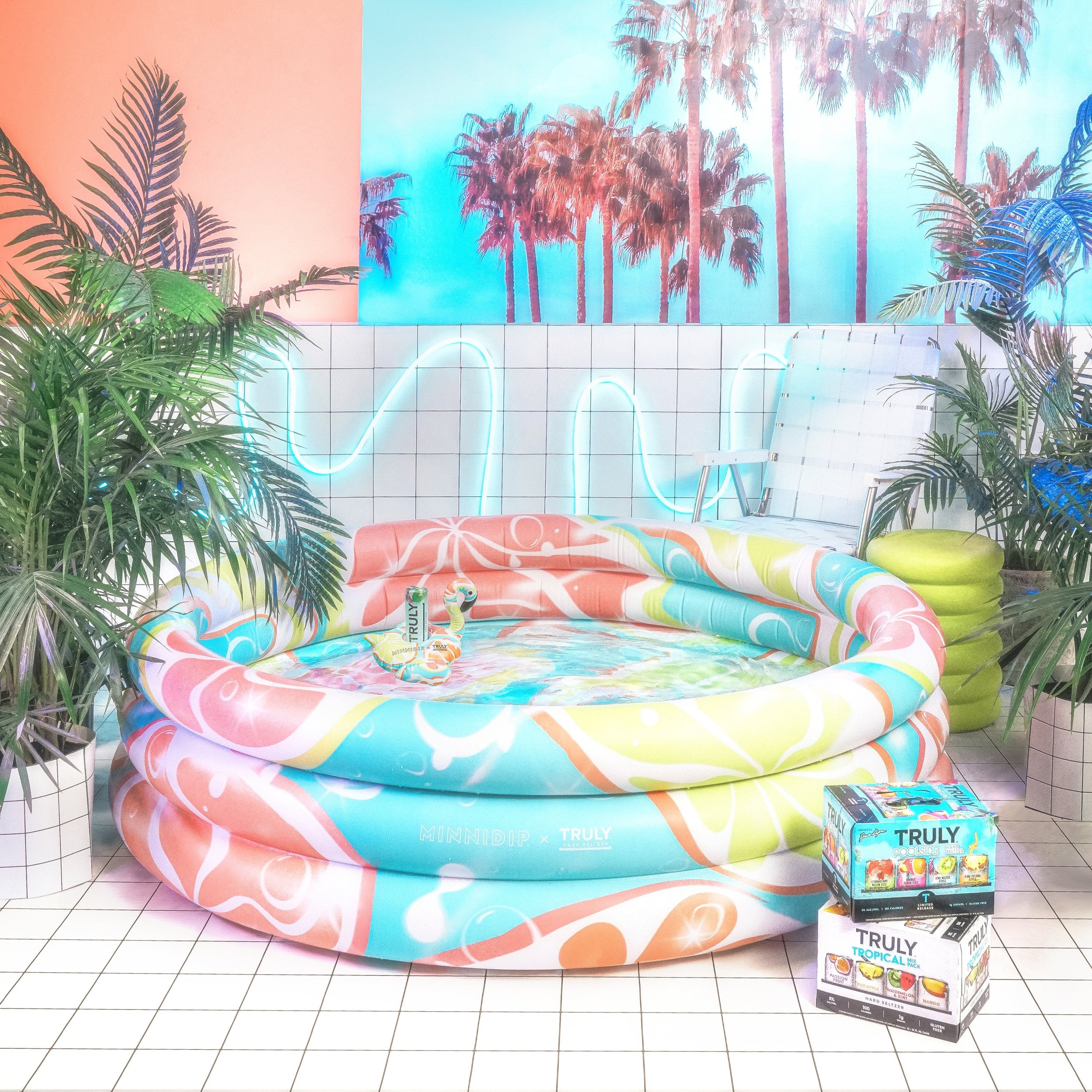 the MINNIDIP x TRULY Luxe Inflatable Pool & Drink Float