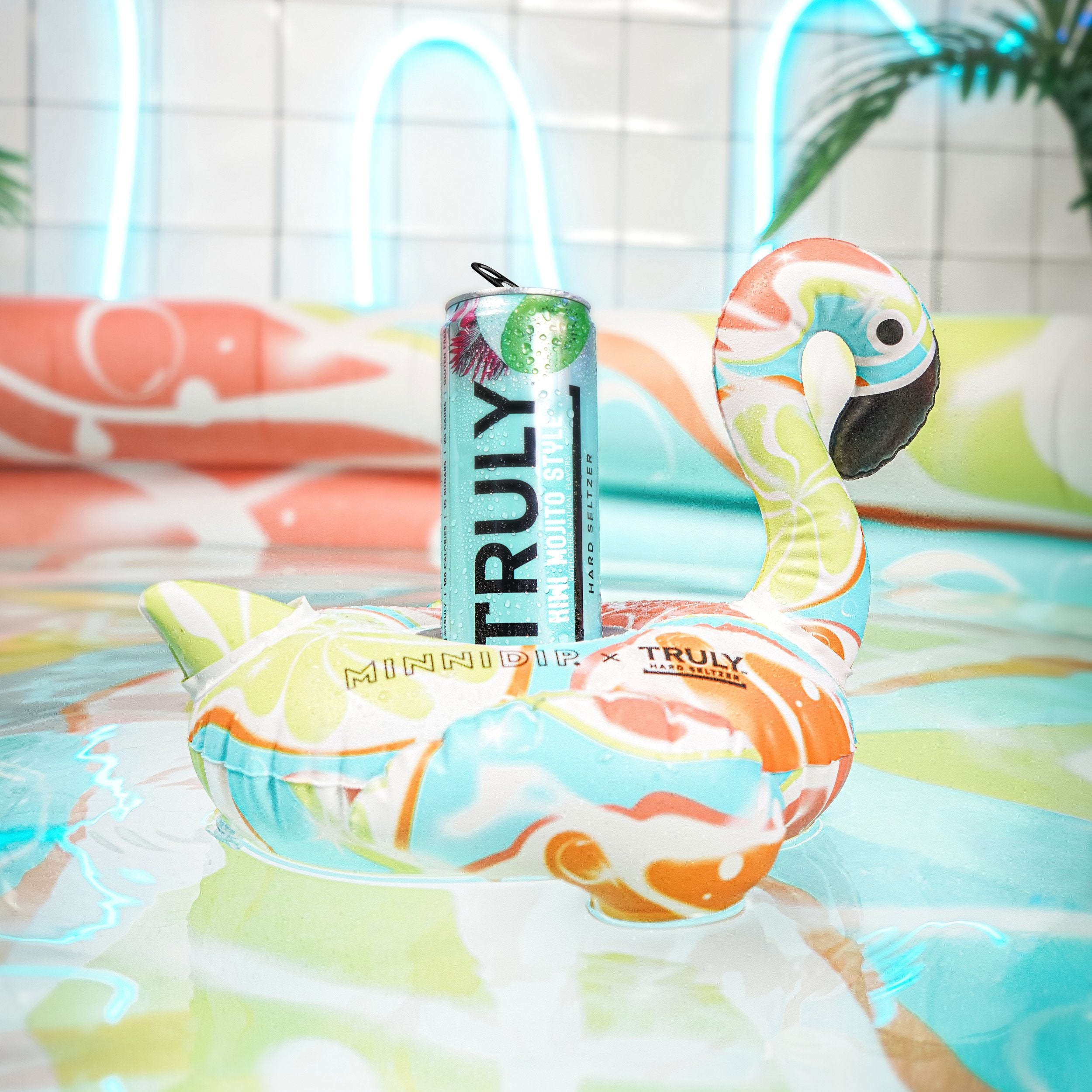 the MINNIDIP x TRULY Luxe Inflatable Pool & Drink Float