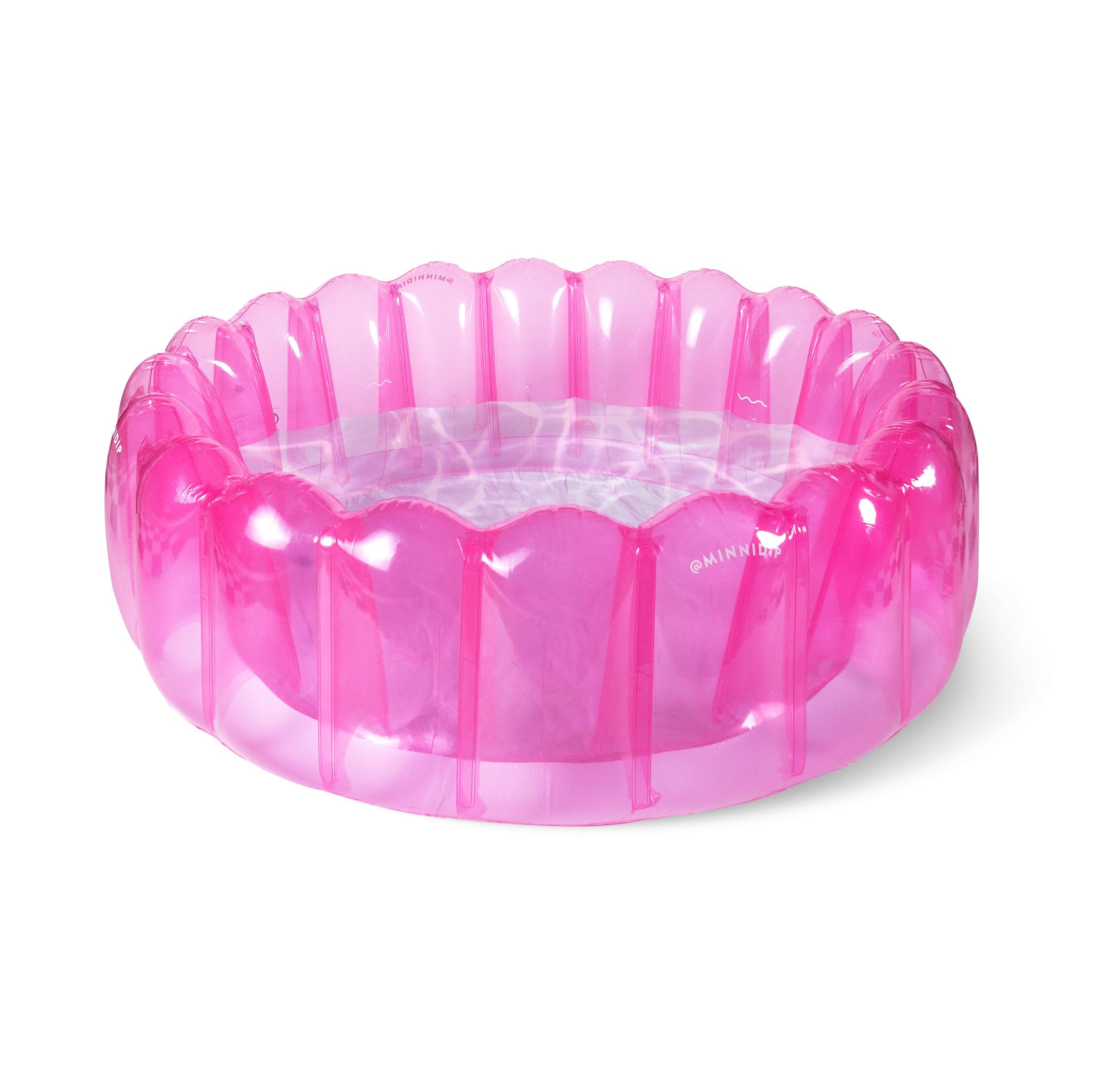 the CLEARLY HOT PINK TUFTED luxe inflatable pool