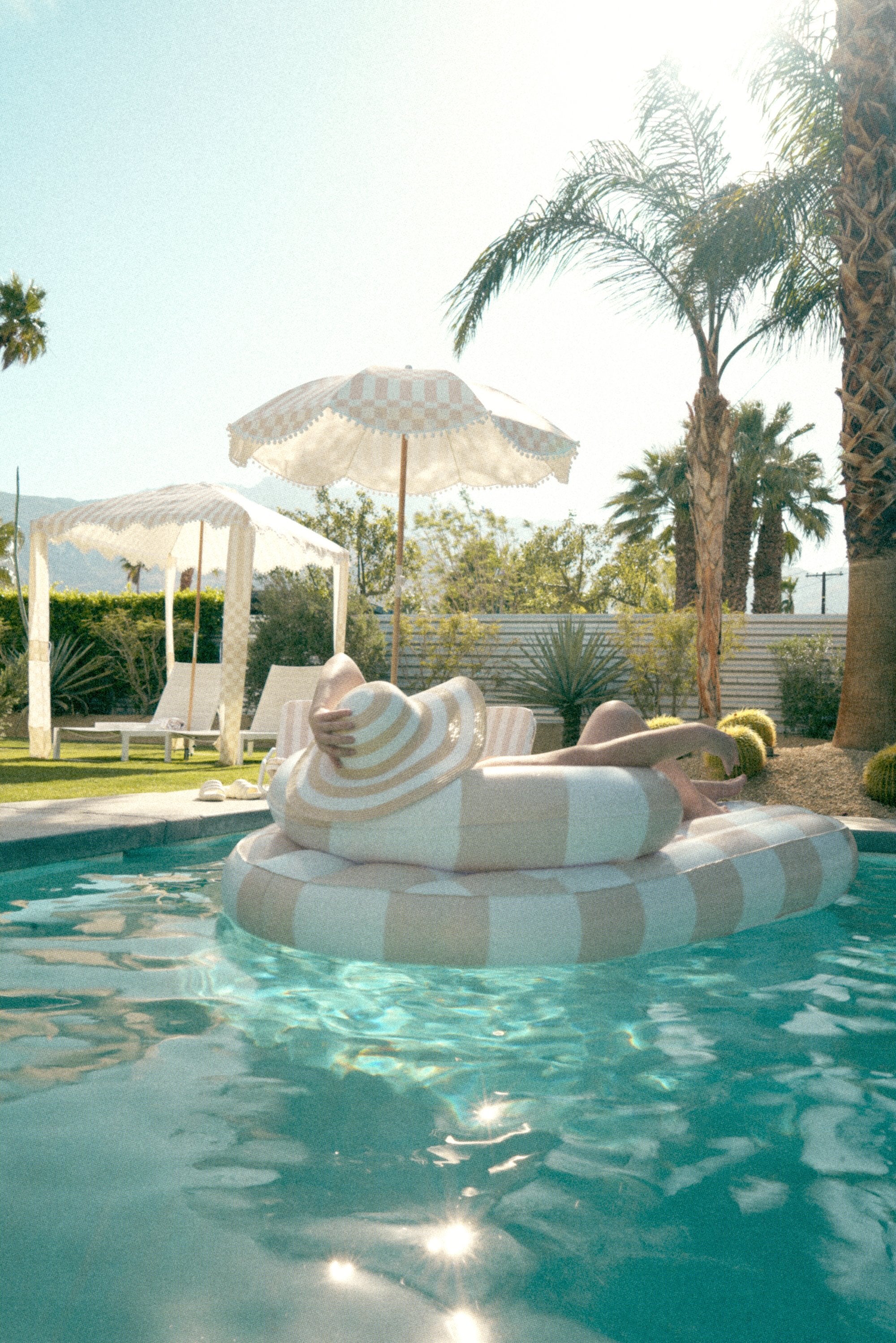 the ARCHED CHECKER Luxe Inflatable Chaise Lounger