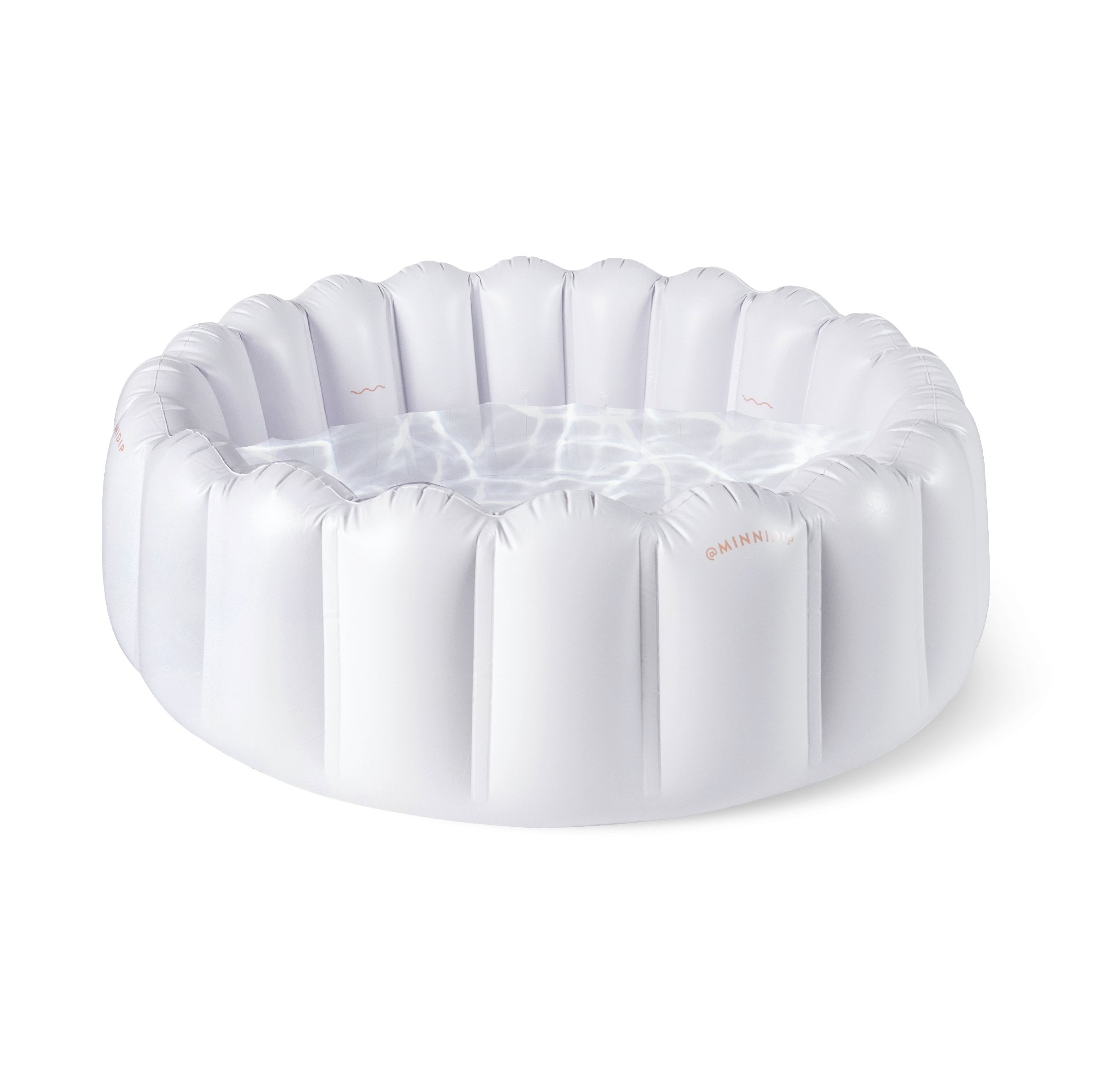 the POWDER TUFTED luxe inflatable pool