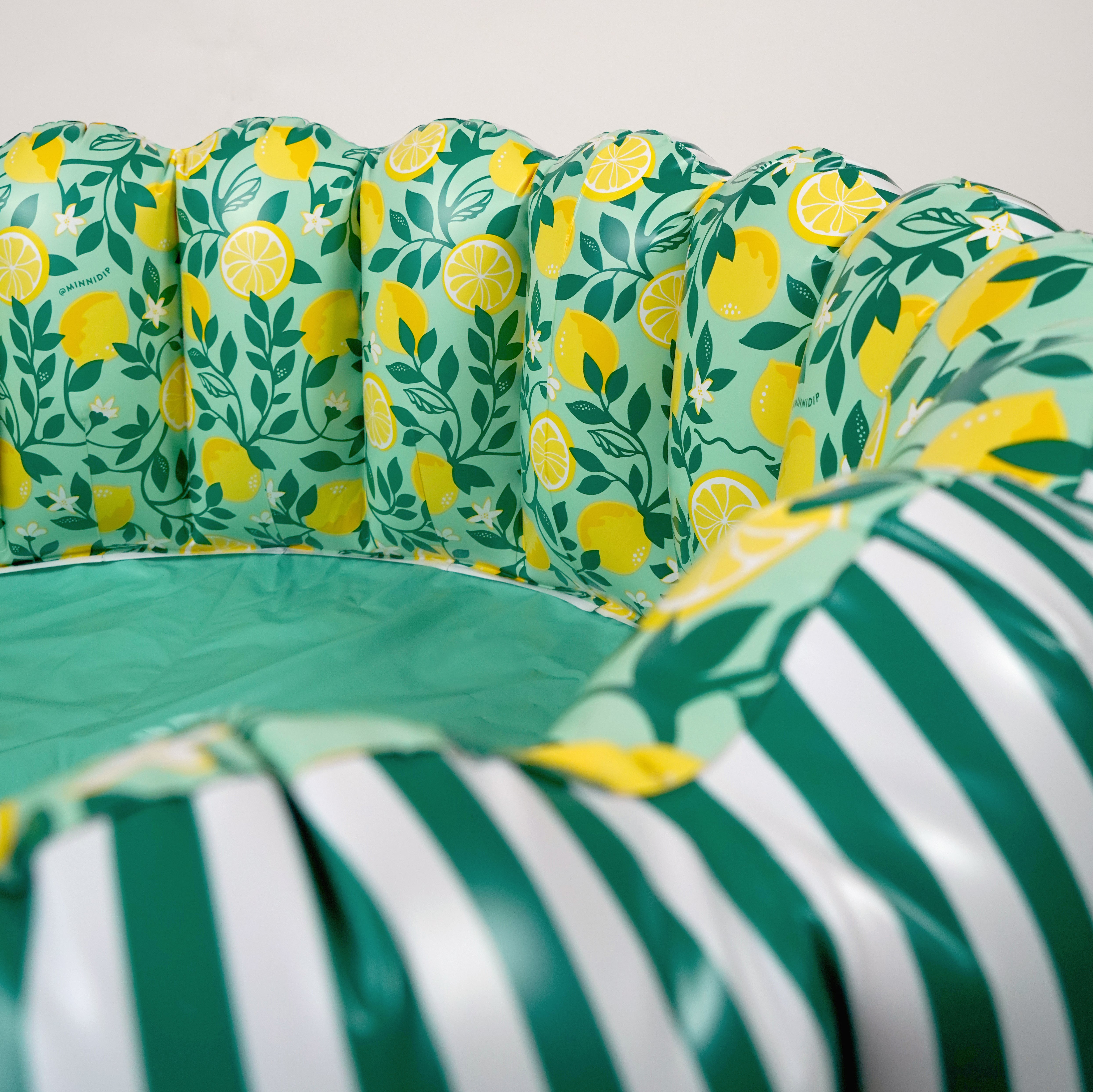 the Tufted STRIPED LIMONE luxe inflatable pool