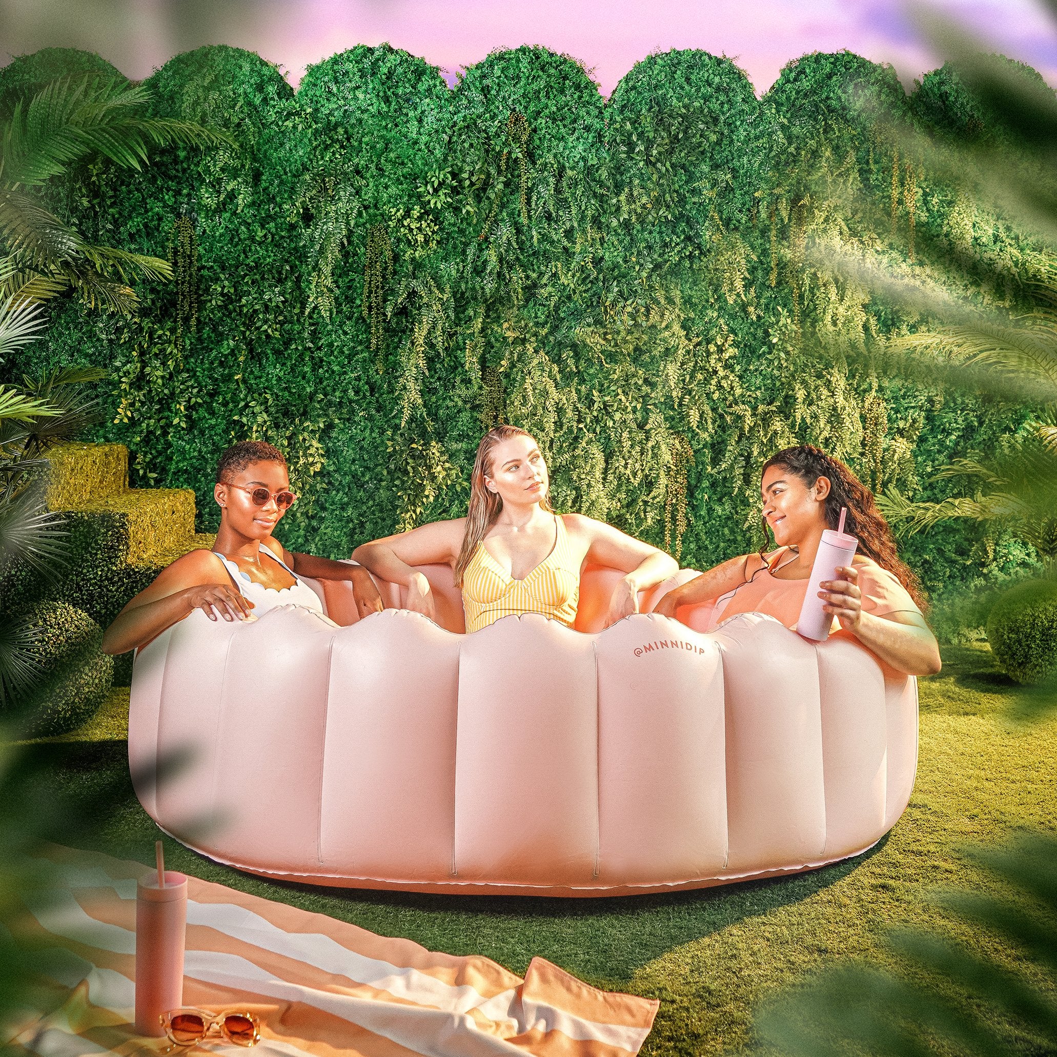 the BLUSHING PALMS luxe inflatable pool