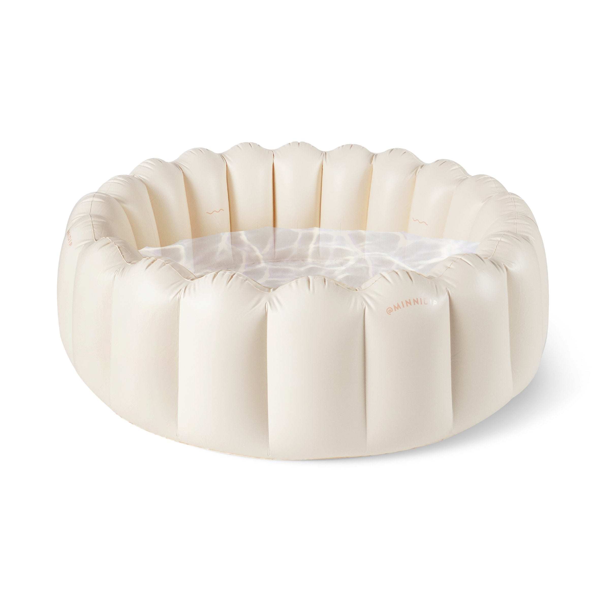 the CREAM TUFTED luxe inflatable pool